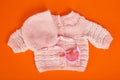 Nurseries knitted jacket and coif Royalty Free Stock Photo