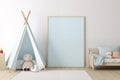 Nursery interior. Bed, toys, photo frame backdrop. Boys blue bedroom. Children's Playroom Royalty Free Stock Photo