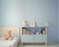 Nursery interior. Bed, toys, photo frame backdrop. Boys blue bedroom. Children's Playroom Royalty Free Stock Photo