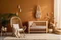 A nursery with macrame mobiles, rag rug, cozy kids room with furniture from natural materials. generative ai