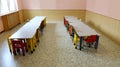 Nursery room used as a refectory with tables and small chairs wi Royalty Free Stock Photo