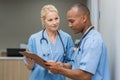 Nurses checking medical reports Royalty Free Stock Photo