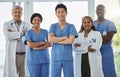 Nurses, portrait and team of doctors with arms crossed standing together in hospital. Face, confident and medical Royalty Free Stock Photo