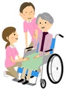 Elderly people in wheelchairs and long-term care staff