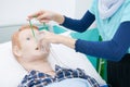 Nursing students are practicing how to provide oxygen administration to the patient by a doll of patient in the simulation