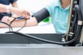 Nursing students are training measurement of blood pressure with manual sphygmomanometer and stethoscope at nursing school. Royalty Free Stock Photo