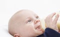 Nursling with milk bottle Royalty Free Stock Photo