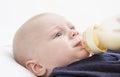 Nursling with milk bottle Royalty Free Stock Photo