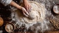 Grandmothers hands expertly kneading bread dough on a wooden table