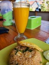 Nusa Lambongan, Bali - 02.12.2020- Nasi Goreng - A famous Balinese fried rice with mango juice served at the lunch time in the