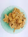 Nusantara food or traditional Indonesian food called peyek, made from flour and small fish, tastes savory and delicious.