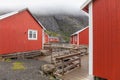 Nusfjord authentic fishing village with traditional red rorbu houses in winter. Lofoten islands, Norway Royalty Free Stock Photo