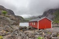 Nusfjord authentic fishing village with traditional red rorbu houses in winter. Lofoten islands, Norway Royalty Free Stock Photo