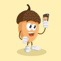 Nut mascot and background with selfie pose Royalty Free Stock Photo