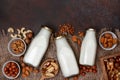 Nut milk in glass bottles Royalty Free Stock Photo