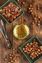 Glass with nut oil Royalty Free Stock Photo