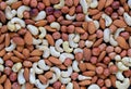 Nut photo background. Cashew, almond, hazelnut mix closeup. Organic food rustic banner template.