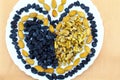 Nut-raisin love on a plate Royalty Free Stock Photo