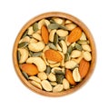 Nut-seed mix, crunchy roasted and unsalted, in a wooden bowl Royalty Free Stock Photo