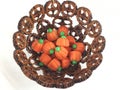 Nut shell bowl with pumpkin candies Royalty Free Stock Photo