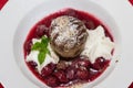 Nut souffle with sour cherry compote Royalty Free Stock Photo