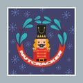 Nutcracker card with laurel wreath and snowflakes