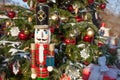 Nutcracker  at Christmas Market  in Winter Moscow, Russia. Advent Decoration and fir tree with Crafts gifts on the Bazaar. Street Royalty Free Stock Photo