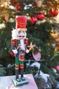 Nutcracker at Christmas Market  in Winter Moscow, Russia. Advent Decoration and fir tree with Crafts gifts on the Bazaar. Street Royalty Free Stock Photo