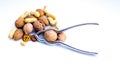 nutcracker and dried fruit composition with walnuts, almonds and peanuts to indicate its benefits Royalty Free Stock Photo