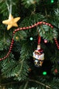 The Nutcracker On A Fir-tree. Christmas Decoration Of A Fir-tree. New Year`s Background.
