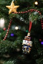 The Nutcracker On A Fir-tree. Christmas Decoration Of A Fir-tree. New Year`s Background.