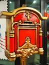 Nutcracker mailbox in festive New Year's Christmas style. Red gold postbox. Nutcracker Christmas soldier. Post