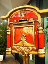 Nutcracker mailbox in festive New Year's Christmas style. Red gold postbox. Nutcracker Christmas soldier. Post