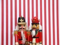 Nutcrackers on red and white stripes