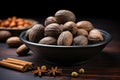 Nutmeg in Black Plate, Myristica Fragrans Fruit, Dry Spicy Nutmeg, Grated Whole Muscat Nut, Nut Meg