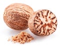 Nutmeg and ground nutmeg heap isolated on white background Royalty Free Stock Photo