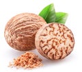 Nutmeg and ground nutmeg heap isolated on white background Royalty Free Stock Photo