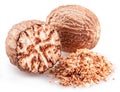 Nutmeg and ground nutmeg heap isolated on white background Royalty Free Stock Photo
