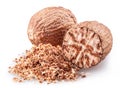 Nutmeg and ground nutmeg heap isolated on white background Royalty Free Stock Photo