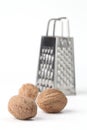 Nutmegs and grater Royalty Free Stock Photo