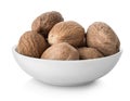 Nutmegs in plate Royalty Free Stock Photo