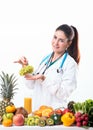 Nutrition doctor holding a grape fruits