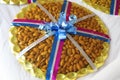 Nutrition rich California almonds packed as a decorated gift with ribbon are other nuts.