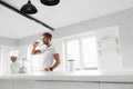 Nutrition Supplements. Man Drinking Protein Shake Before Workout