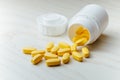 Nutrition supplements, yellow multivitamin pills Royalty Free Stock Photo