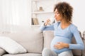 Pregnant woman drinking glass of milk, enjoying healthy drink Royalty Free Stock Photo