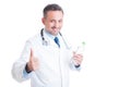 Nutritionist doctor holding bottle of water and showing like Royalty Free Stock Photo