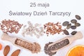 Nutritious ingredients and polish inscription 25 May World Thyroid Day. Healthy food containing vitamins. Problems with thyroid
