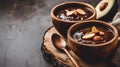 Nutritious Plant-Based Smoothie With Almonds, Chocolate, And Avocado - A Bowl Of Chocolate Pudding With Nuts And A Spoon Royalty Free Stock Photo