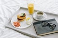 Nutritious and tasty breakfast in bed on tray Royalty Free Stock Photo